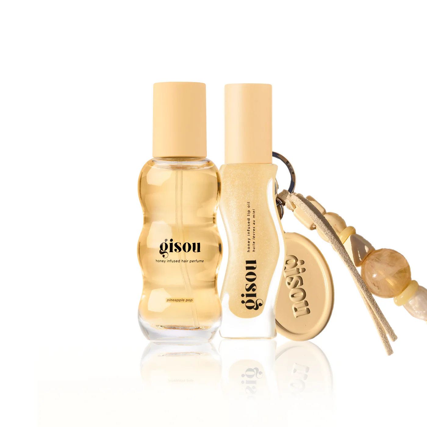 Gisou Tropical Pineapple Set con lip oil tropical, hair perfume y keychain edición limitada